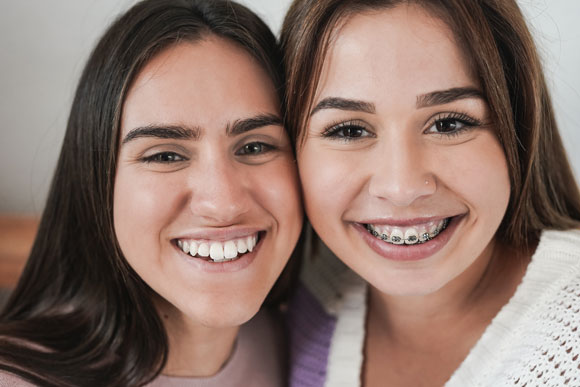 How metal braces looks verse Invisalign